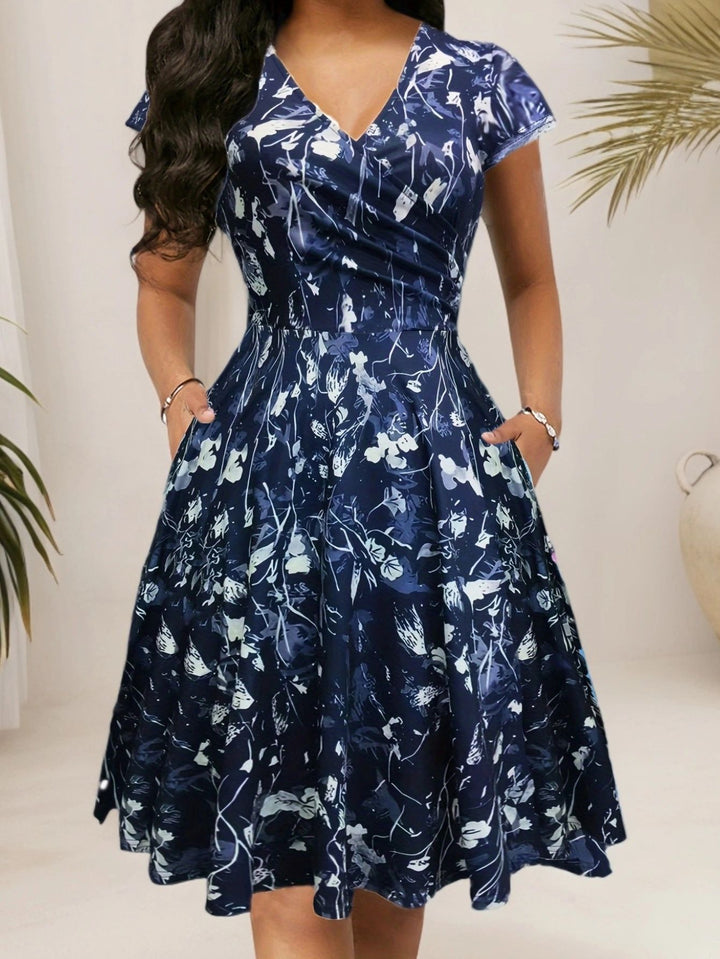 Damen Blumenkleid mit V-Ausschnitt und Taschen Drune