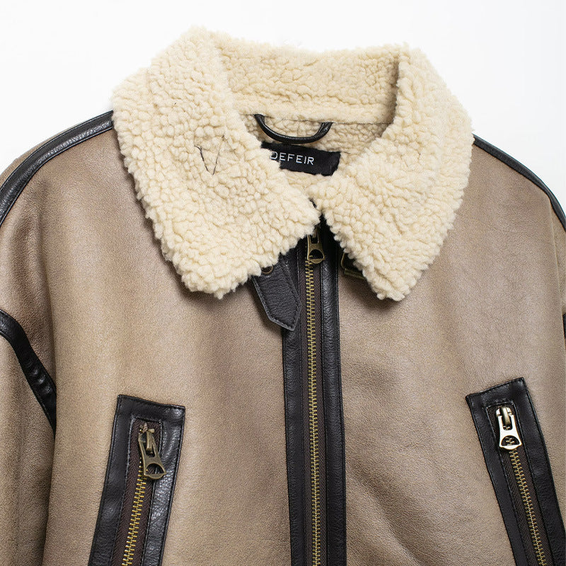 Damen Modische Übergangsjacke aus hochwertigem Kunstleder mit Teddyfell-Kragen und praktischen Taschen Drune