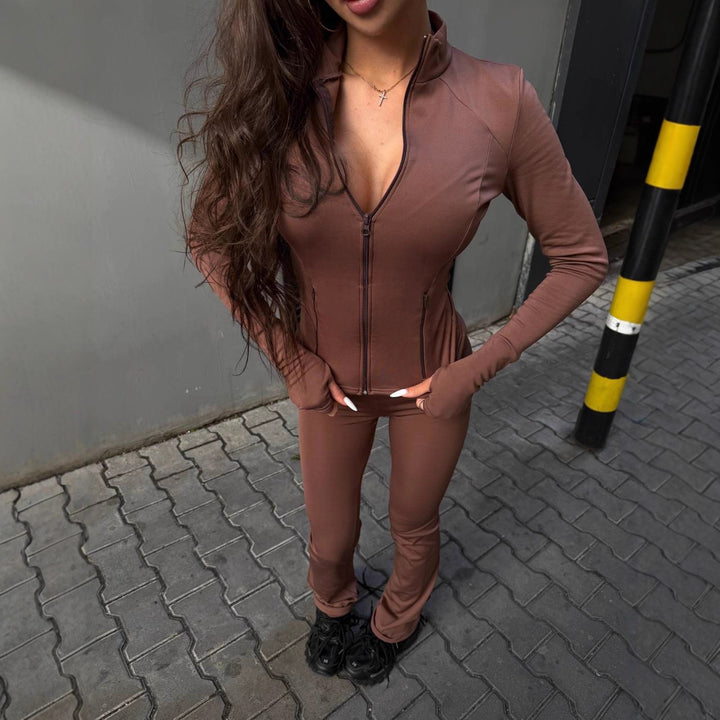 Damen Sportjacke mit hohem Kragen und funktionalen Taschen Drune