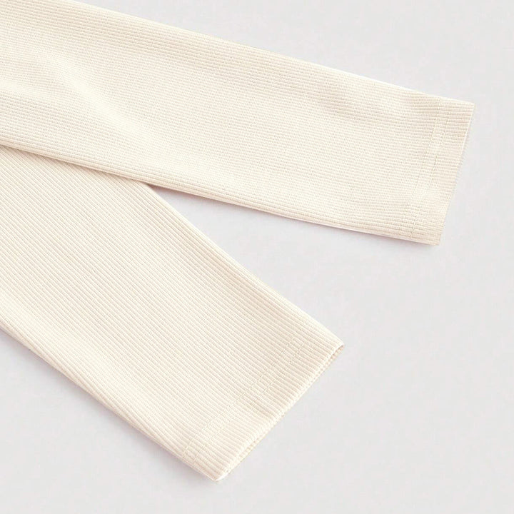 Damen langärmliges Crop-Shirt mit asymmetrischem Ausschnitt und feiner Rippstruktur Drune