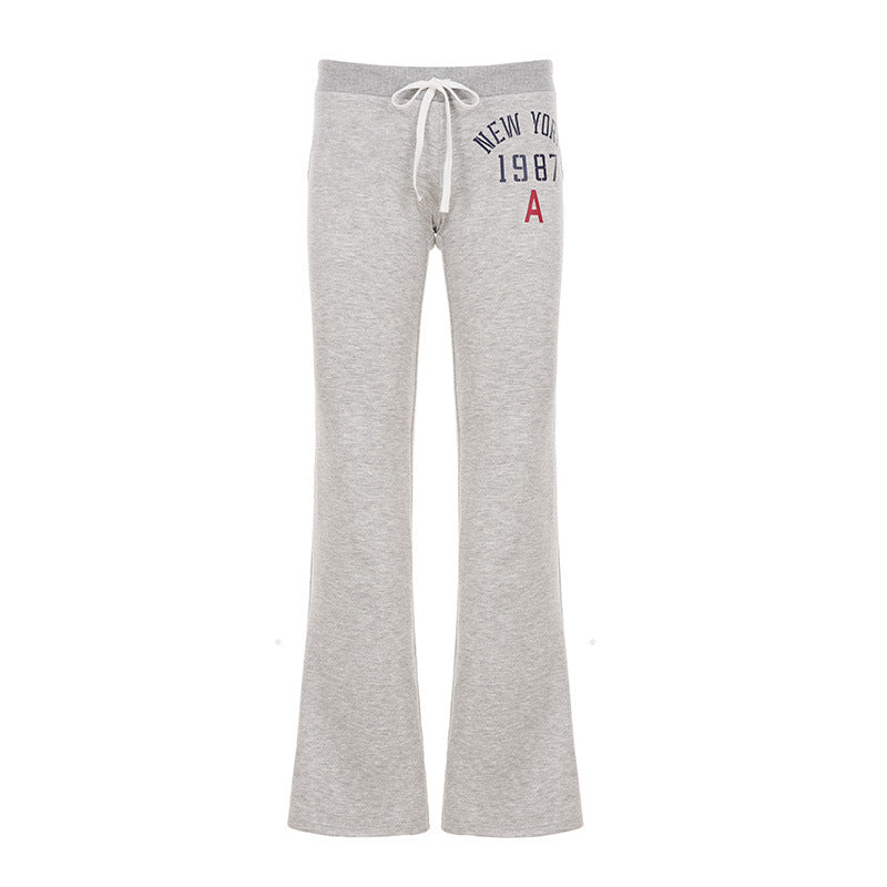Damen nan weiche Flared-Jogginghose mit Kordelzug, Eingrifftaschen und auffälligem Love-Print Drune