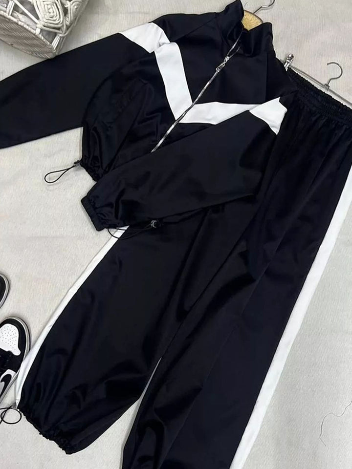Damen sportlicher Windbreaker mit elastischen Bündchen und reflektierenden Details Drune