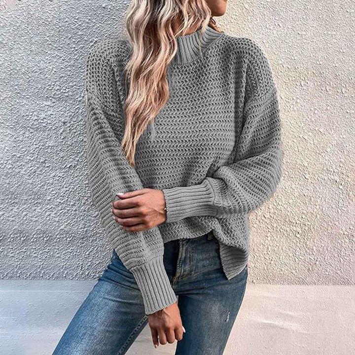 Damen Grobstrickpullover mit hohen Kragen und luftiger Passform Drune