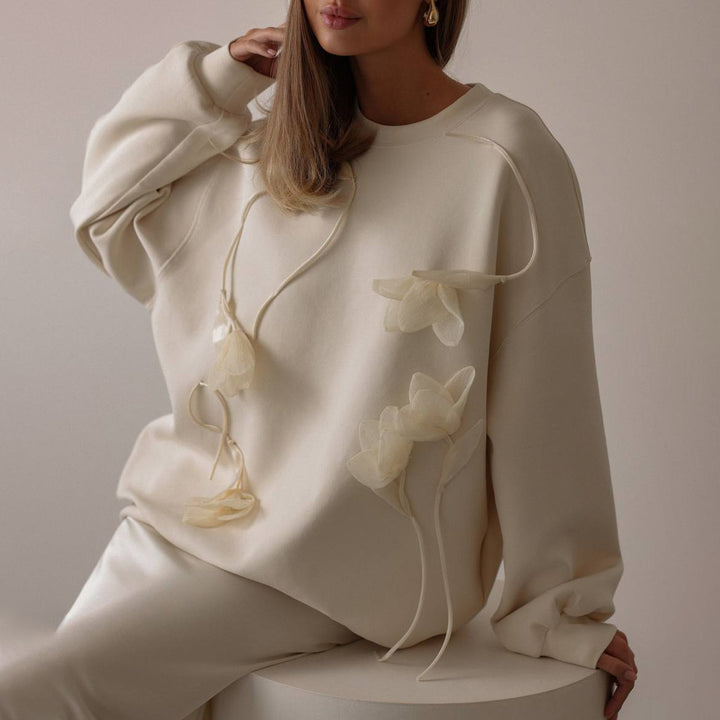 Damen Sweatshirt mit floralen Applikationen und lässigem Schnitt Drune