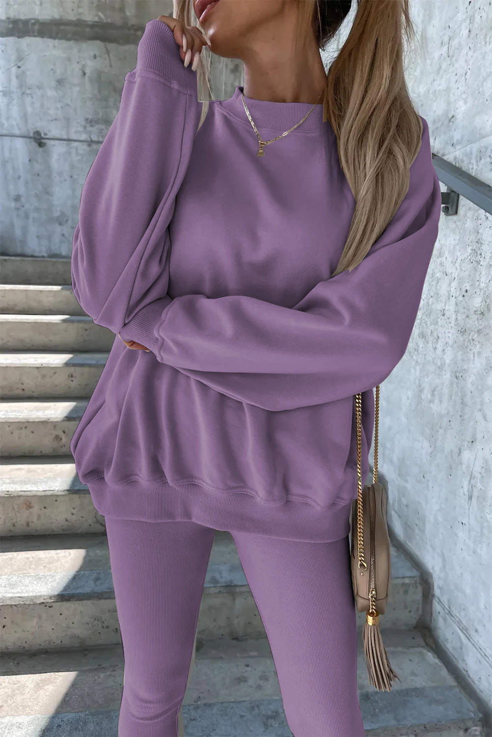 Damen sportliches Freizeitset mit lässigem Oversized-Sweatshirt und enganliegenden Leggings Drune
