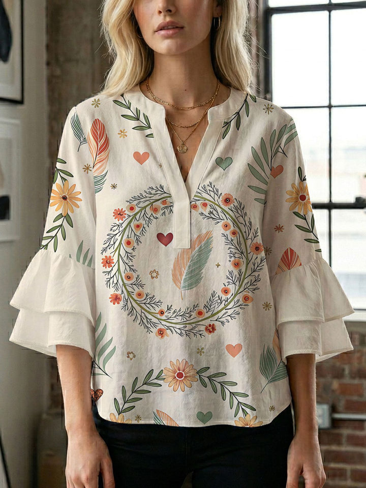 Damen Bluse mit voluminösen Flügelärmel und intensivem Blattmuster Drune