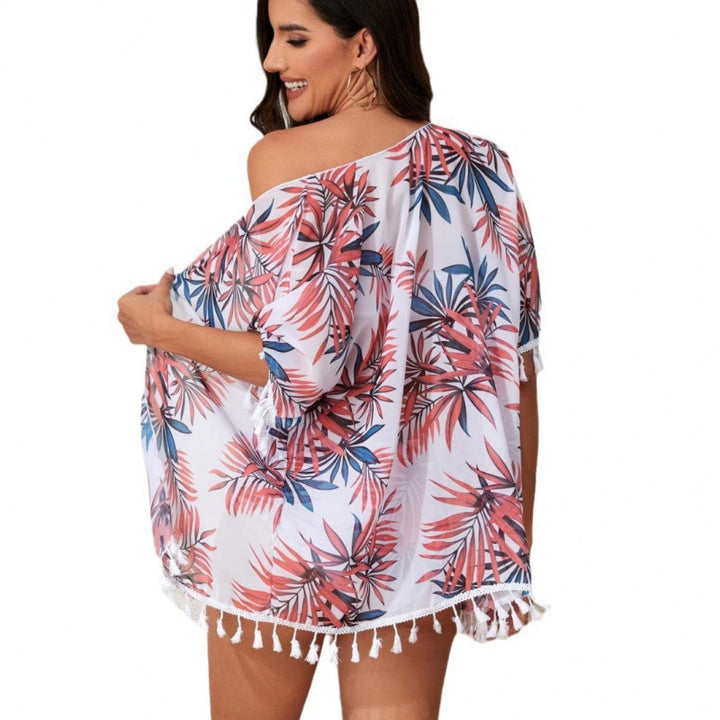 Damen Strandkleid mit floralem Design und fransenverziertem Überwurf Drune