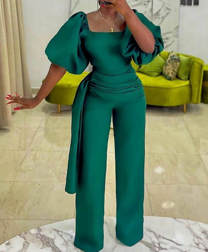 Damen Eleganter Jumpsuit mit voluminösen Puffärmeln und tailliertem Bund Drune