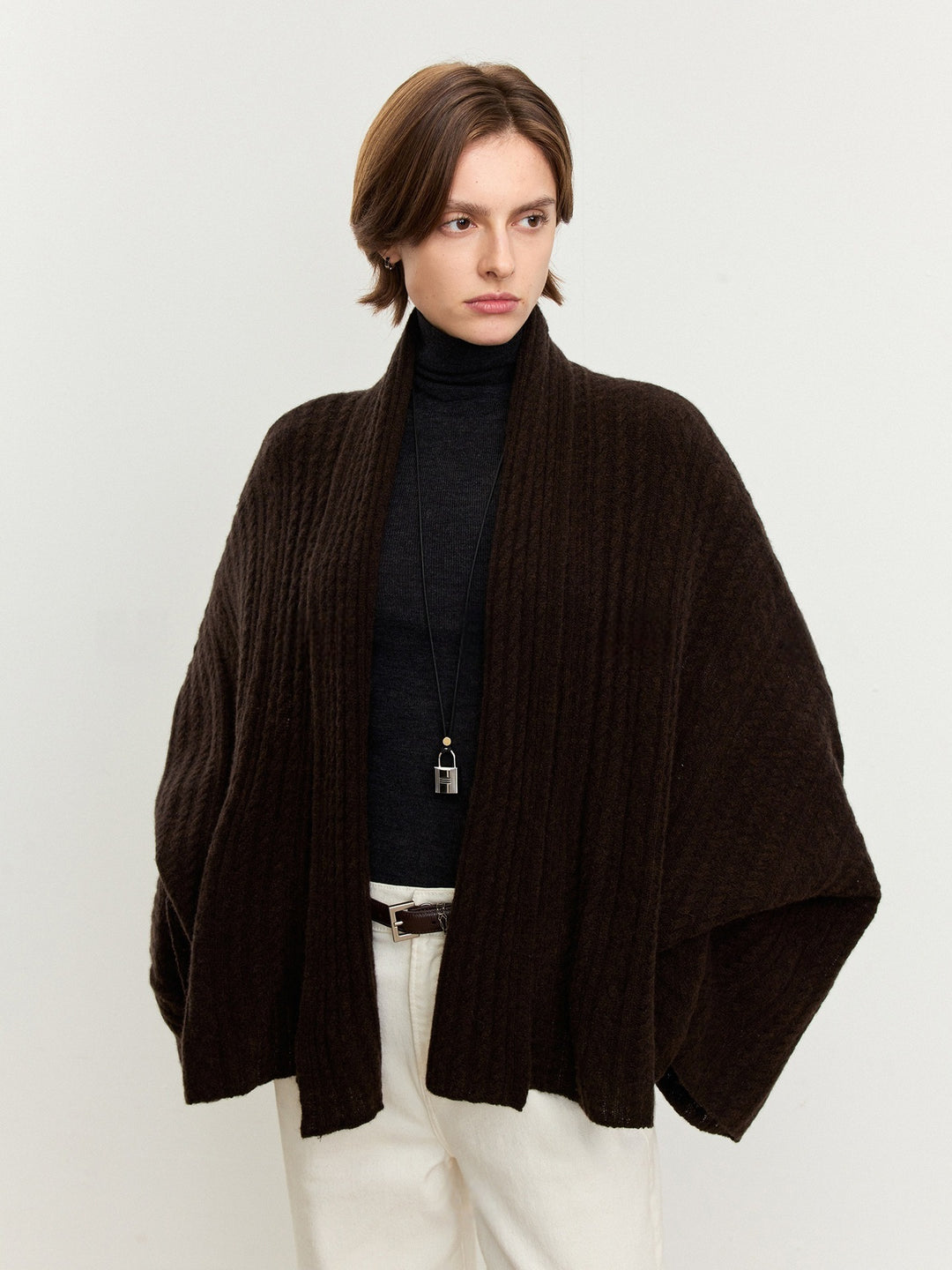 Damen luftiger Strickponcho aus feiner Wolle Drune