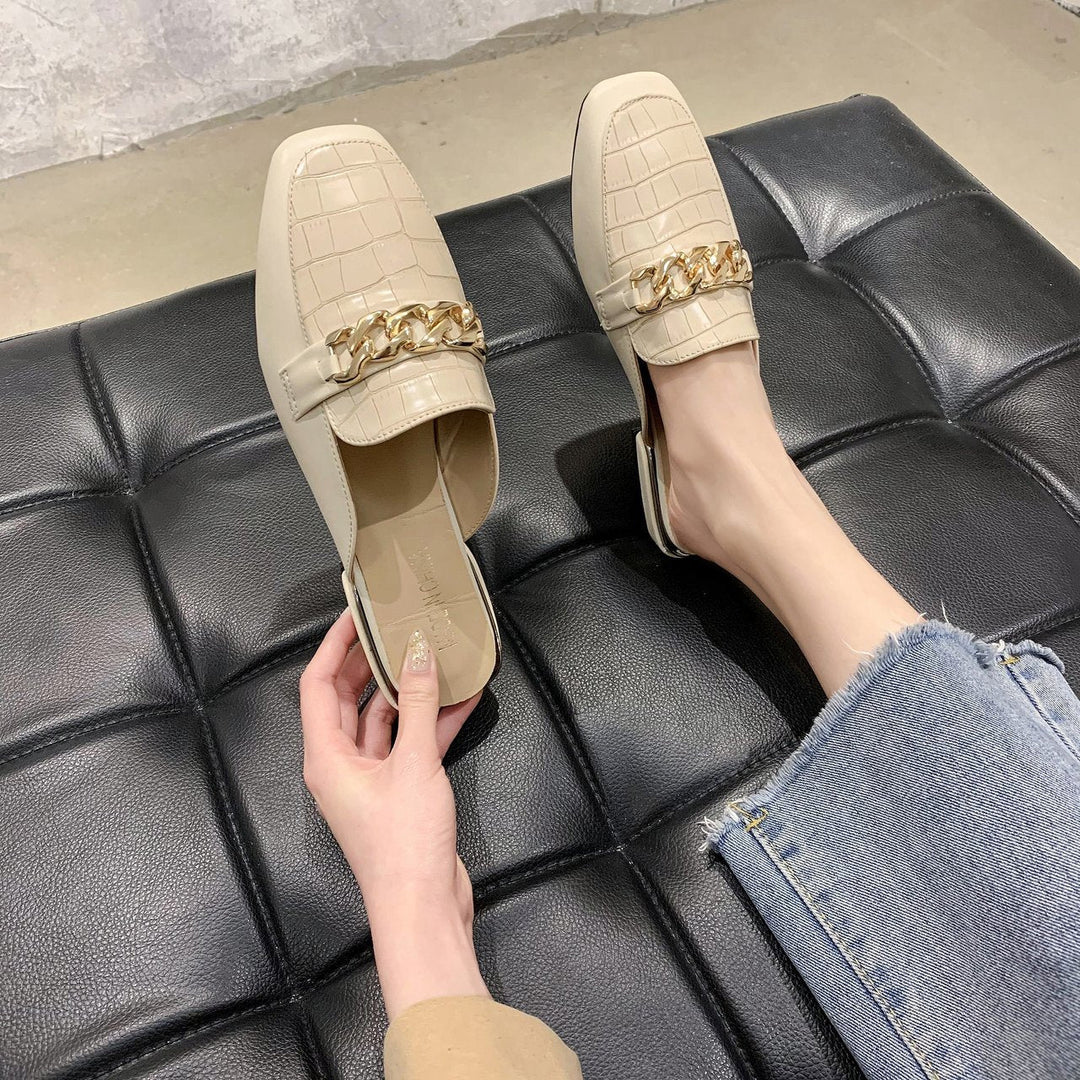 Damen Mules mit hochwertiger Kroko-Prägung und modischer Kettenapplikation Drune