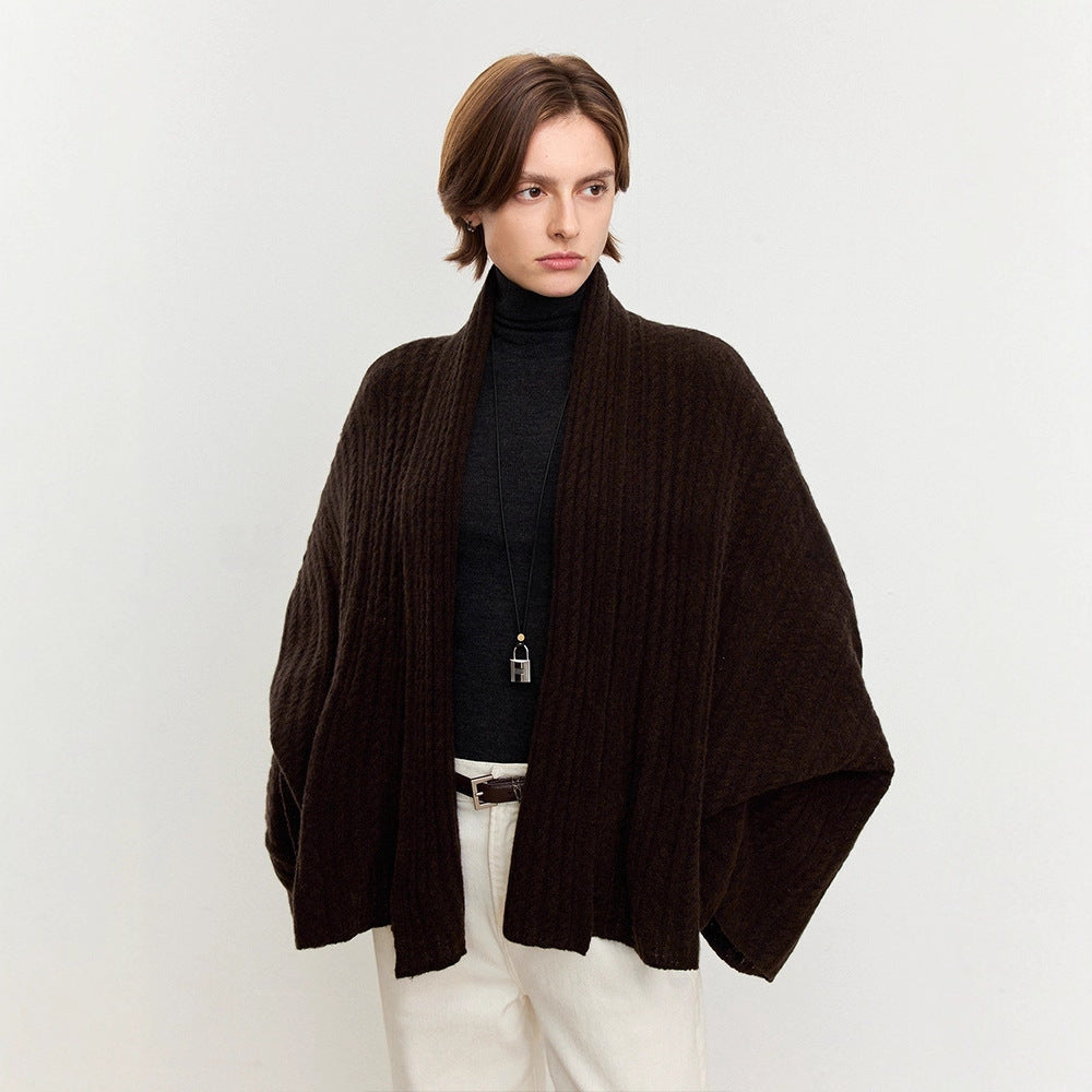 Damen luftiger Strickponcho aus feiner Wolle Drune