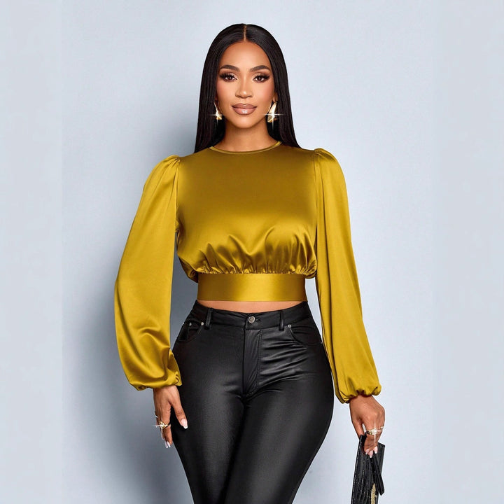 Damen Elegant geschnittene Leoparden-Bluse mit Dekolleté und Schleifenrand Drune