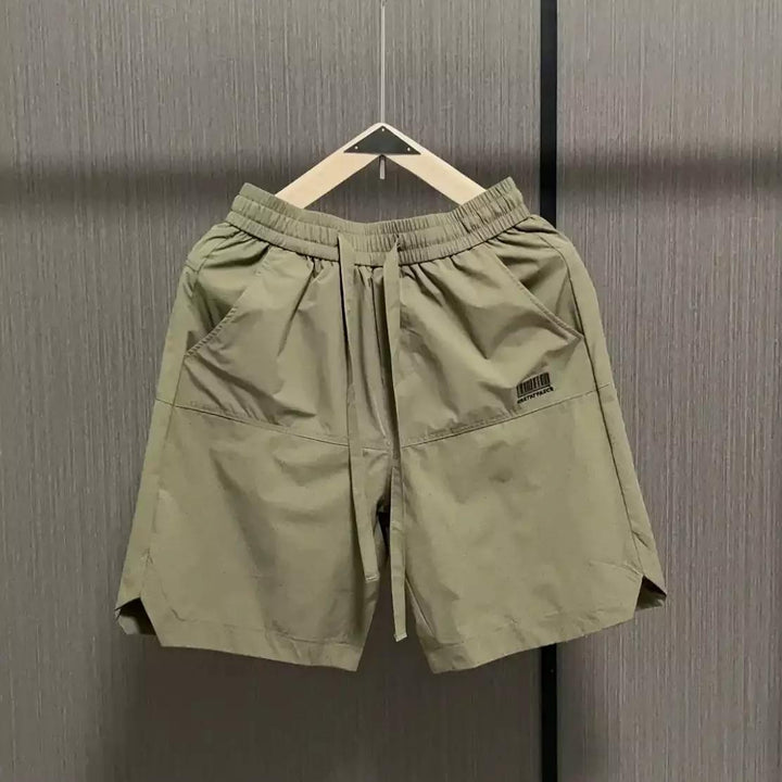 Herren lässige Sportshorts mit elastischem Bund und seitlichen Eingrifftaschen Drune