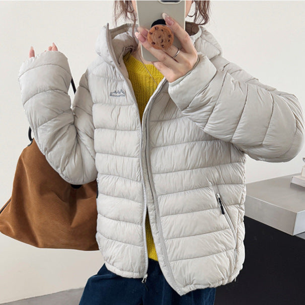 Damen ultraleichte Pufferjacke mit abnehmbarer Kapuze und elastischem Saum Drune