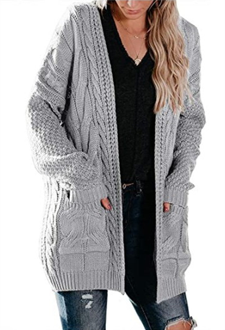 Damen Grobstrickjacke mit femininer Silhouette und praktischen Taschen Drune
