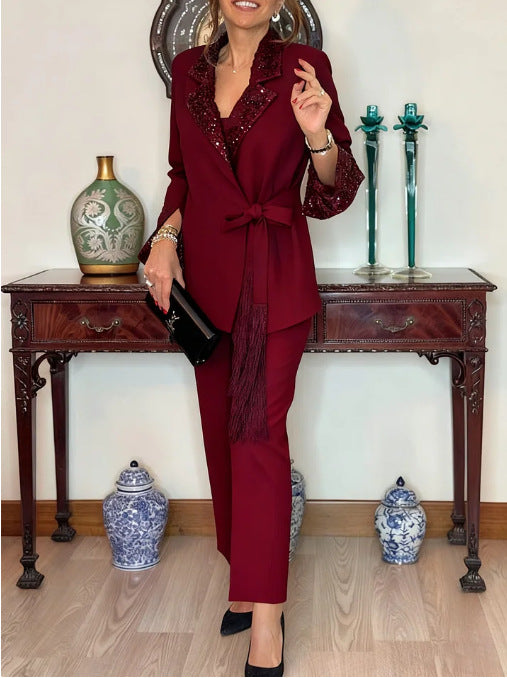 Damen Eleganter Gürtelanzug mit schimmerndem Revers Drune