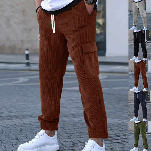Herren nan Cordhose im Joggerstil mit elastischem Tunnelzugbund, aufgesetzten Cargo-Klappentaschen und schmal zulaufendem Bein Drune