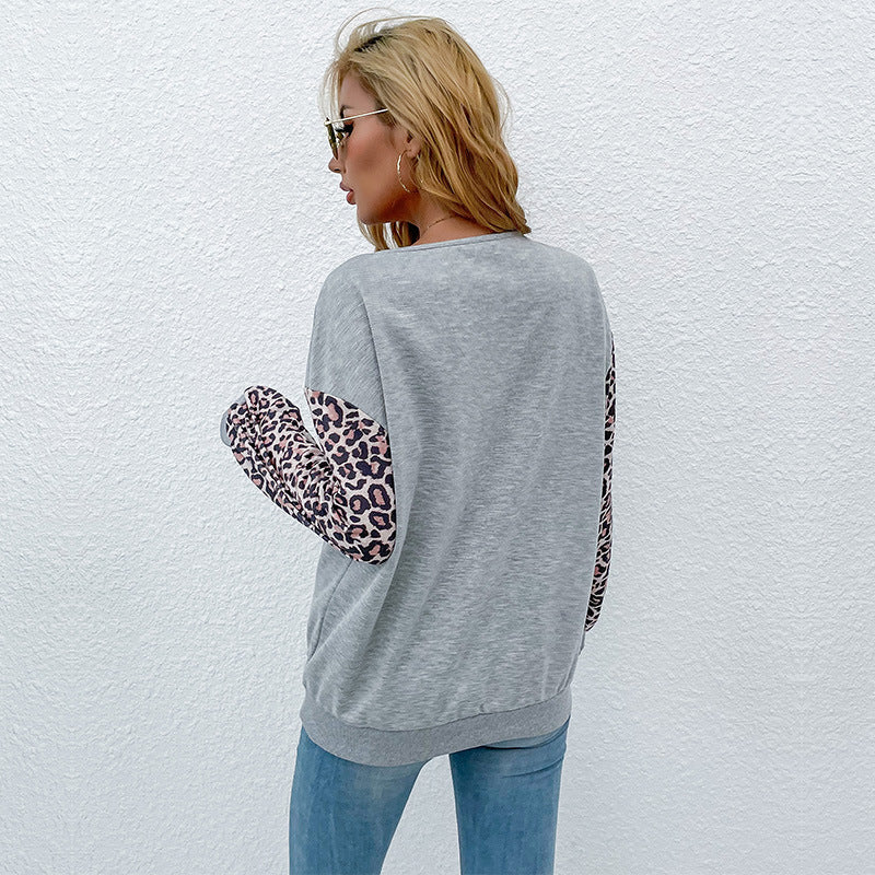 Damen modischer Pullover mit trendigen Animal-Print-Ärmeln und raffiniertem V-Ausschnitt Drune