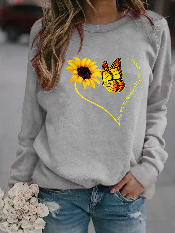 Damen Sweatshirt mit grafischem Schmetterlings- und Sonnenblumenmotiv Drune