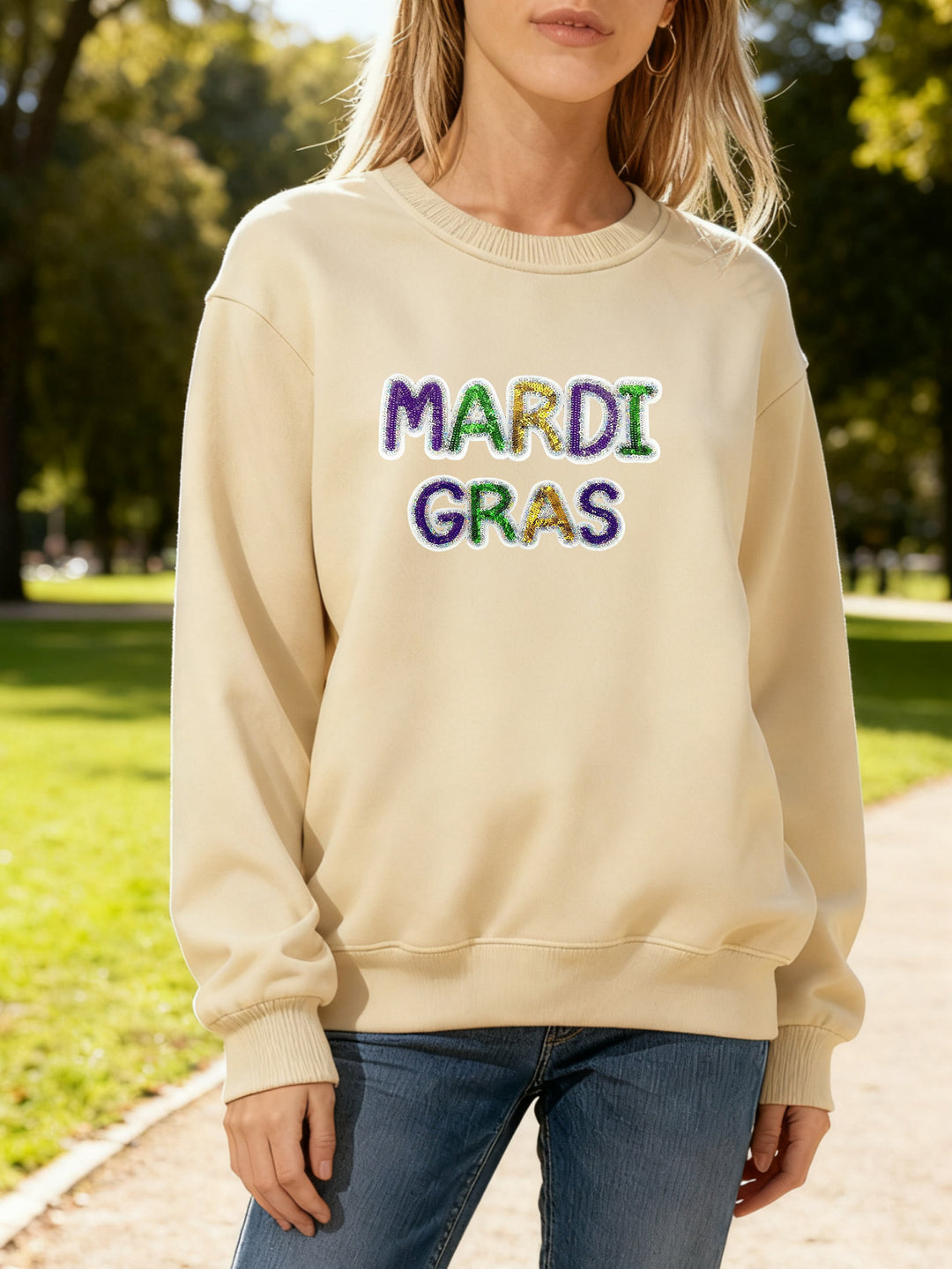 Damen Sweatshirt mit lebhaftem Mardi Gras Schriftzug Drune