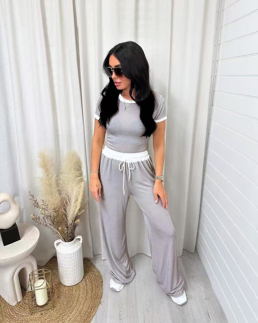 Damen lässiges zwei-teiliges Freizeit-Set mit cropped T-Shirt und weiten Hose Drune