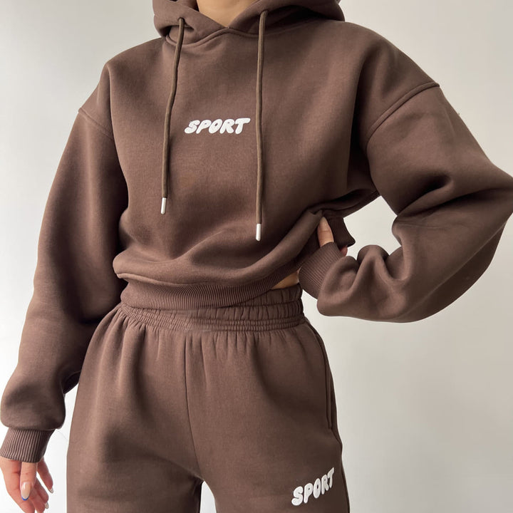 Damen modisches sportliches Set mit cropped Hoodie und weiten Jogginghosen Drune
