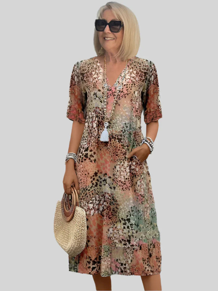 Damen Blumenmuster Midi Kleid mit Taschen Drune
