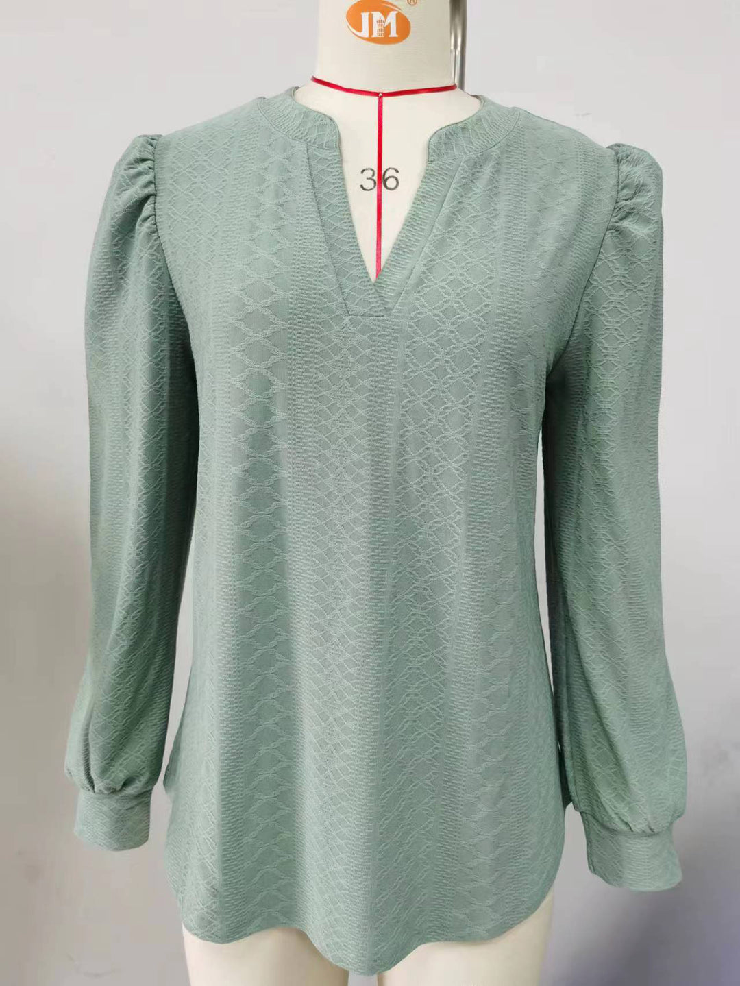 Damen Blusenshirt mit elegantem V-Ausschnitt und strukturiertem Muster Drune
