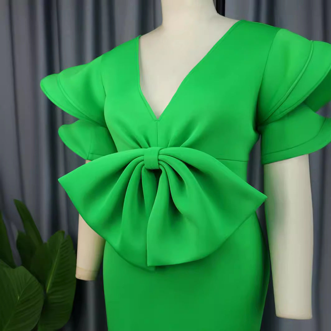 Damen Kleid mit voluminösen Rüschensäumen und dekorativem Schleifenakzent Drune