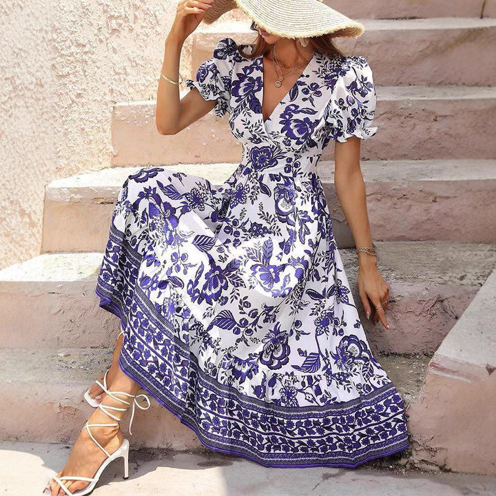 Damen nan boho-inspiriertes Maxikleid mit geraffter Empire-Taille, kurzen Puffärmeln und dekorativem Bordürenprint Drune