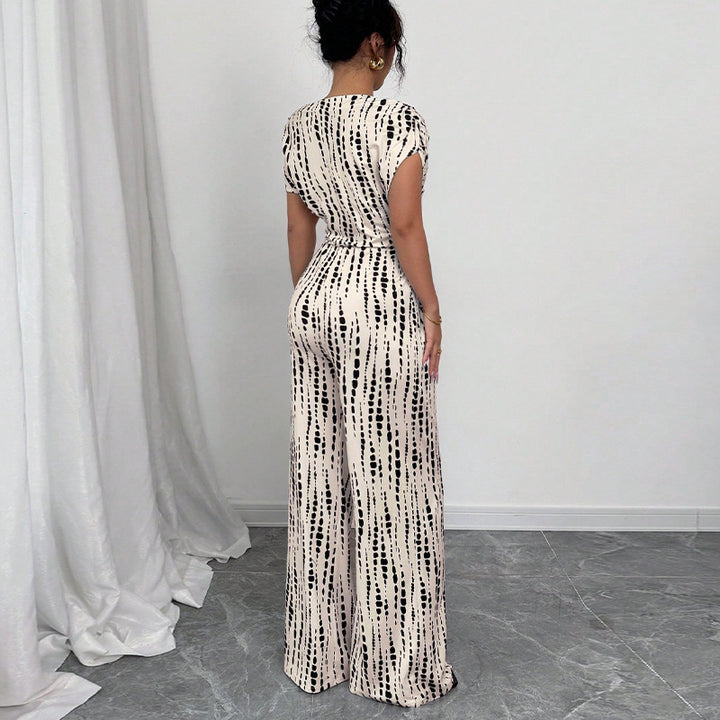 Damen Eleganter Jumpsuit mit asymmetrischem Ausschnitt und floralen Rüschen Drune