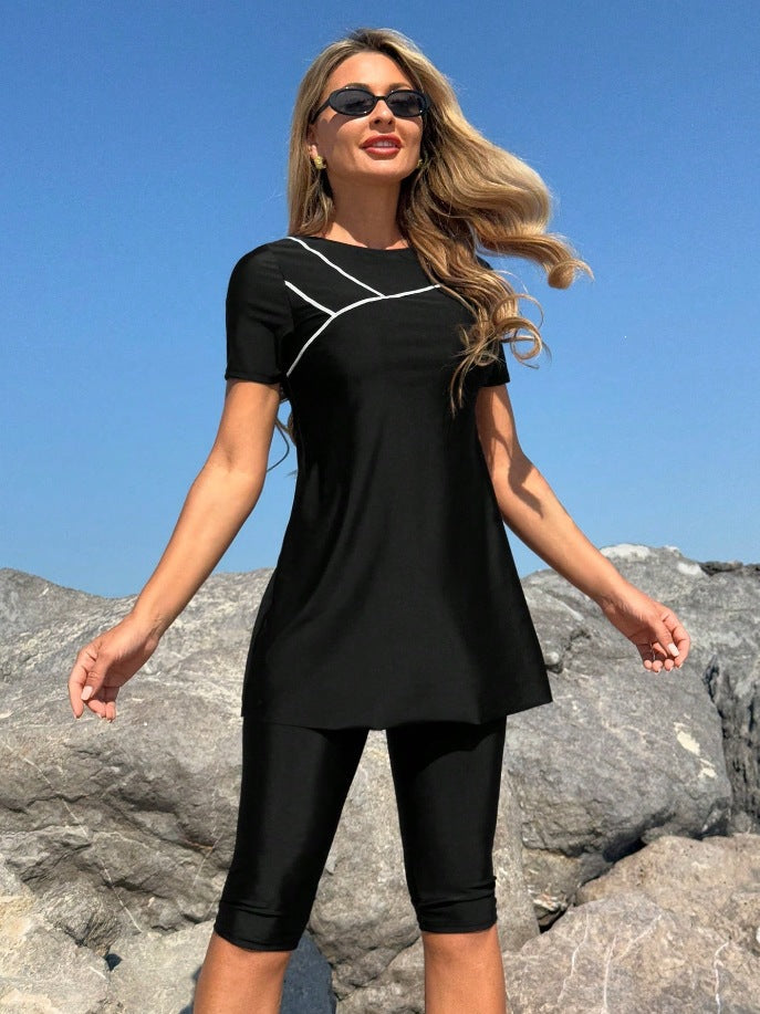 Damen Sportliches Badeset mit kurzem Oberteil und Leggings Drune