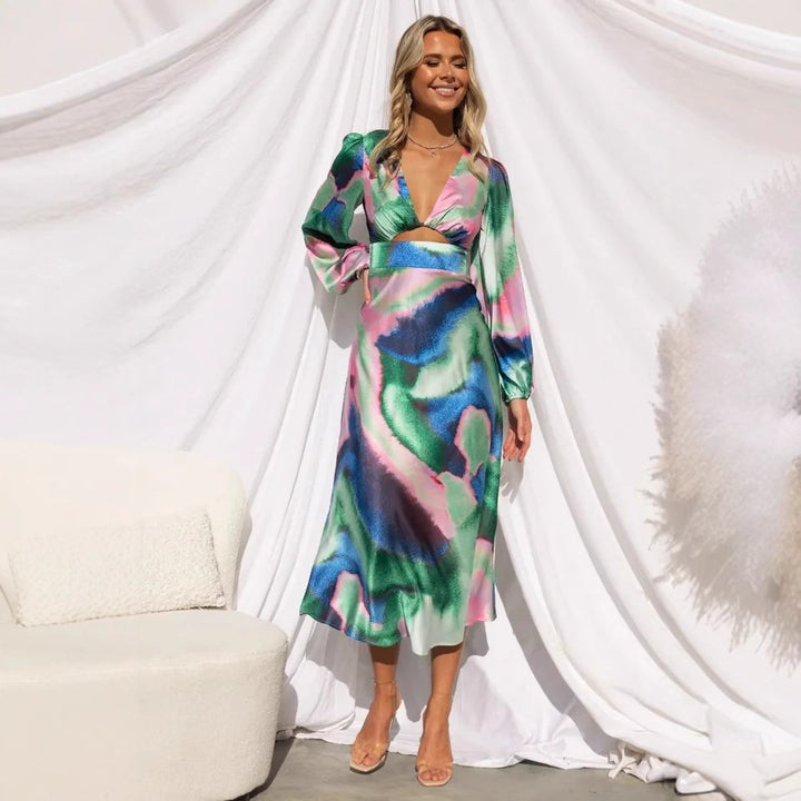 Damen Midi-Kleid mit innovativem Schnitt und farbenfrohem Muster Drune