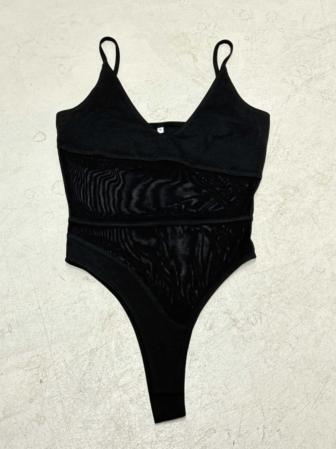 Damen Body mit raffinierten Mesh-Details und tiefem V-Ausschnitt Drune