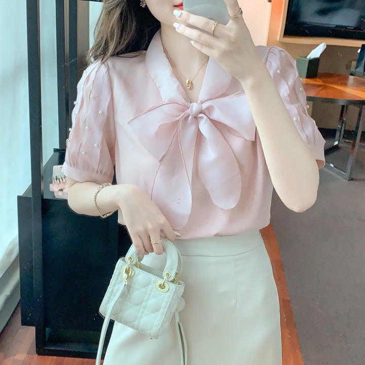Damen Bluse mit elegantem Schleifen-Ausschnitt und strukturierten Ärmeln Drune