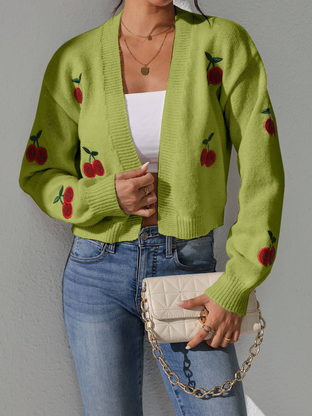 Damen Strickjacke mit floralem Kirschmuster Drune