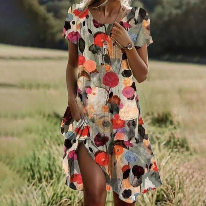 Damen Sommerkleid mit floralem Detail und asymmetrischem Saum Drune