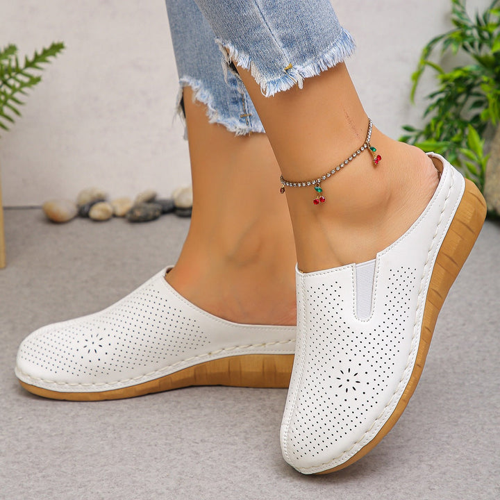 Damen Komfortable Clogs mit atmungsaktivem Leder-Obermaterial und elegantem Holz-Detail Drune