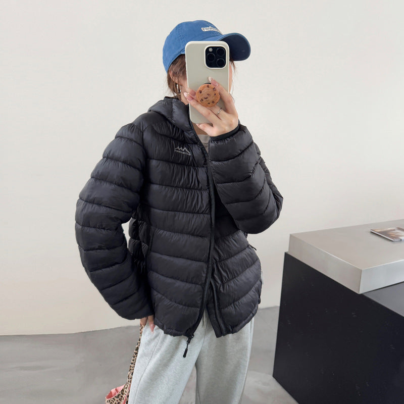 Damen ultraleichte Pufferjacke mit abnehmbarer Kapuze und elastischem Saum Drune