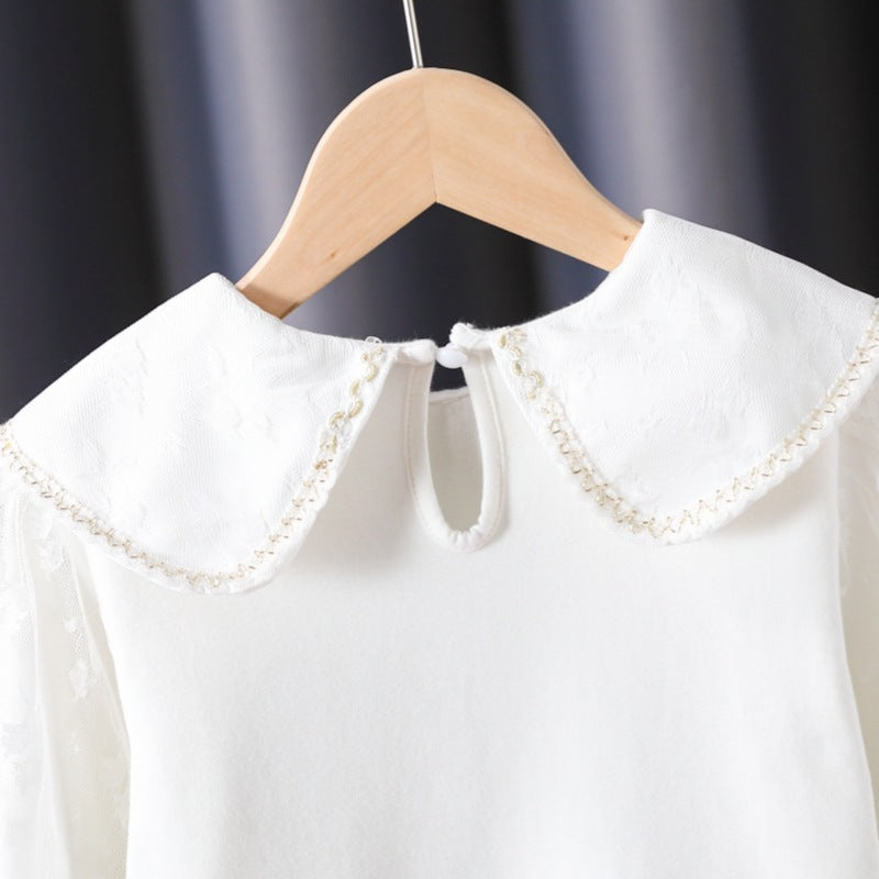 Damen Bluse mit dekorativen Blumenapplikationen und transparenten Puffärmeln Drune