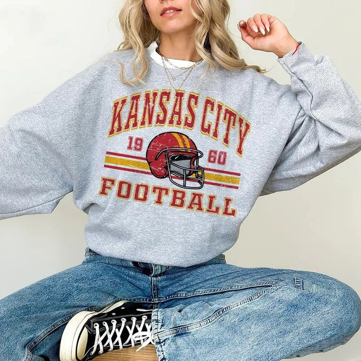 Damen Oversized Sweatshirt mit nostalgischem Football-Motiv Drune
