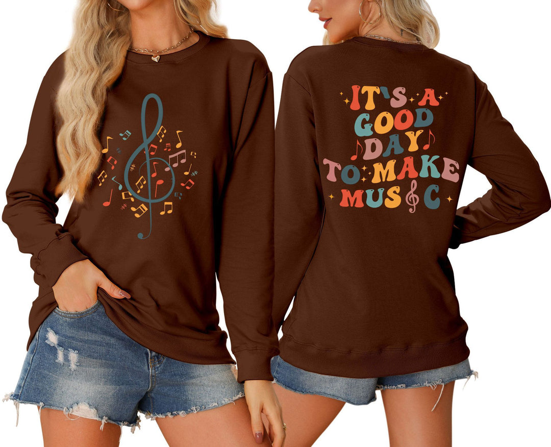 Damen Sweatshirt mit musikalischem Motiv und kreativem Schriftzug Drune