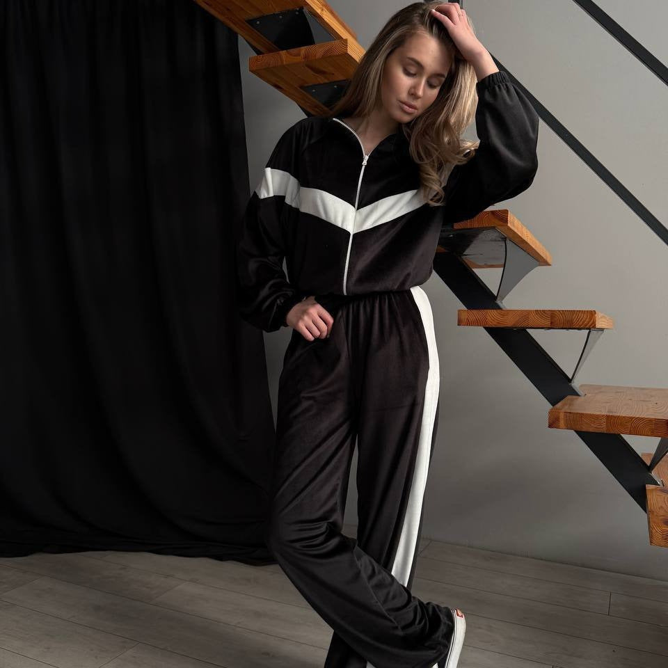 Damen sportlicher Fleece-Jumpsuit mit hohem Kragen und kontrastierenden Einsätzen Drune