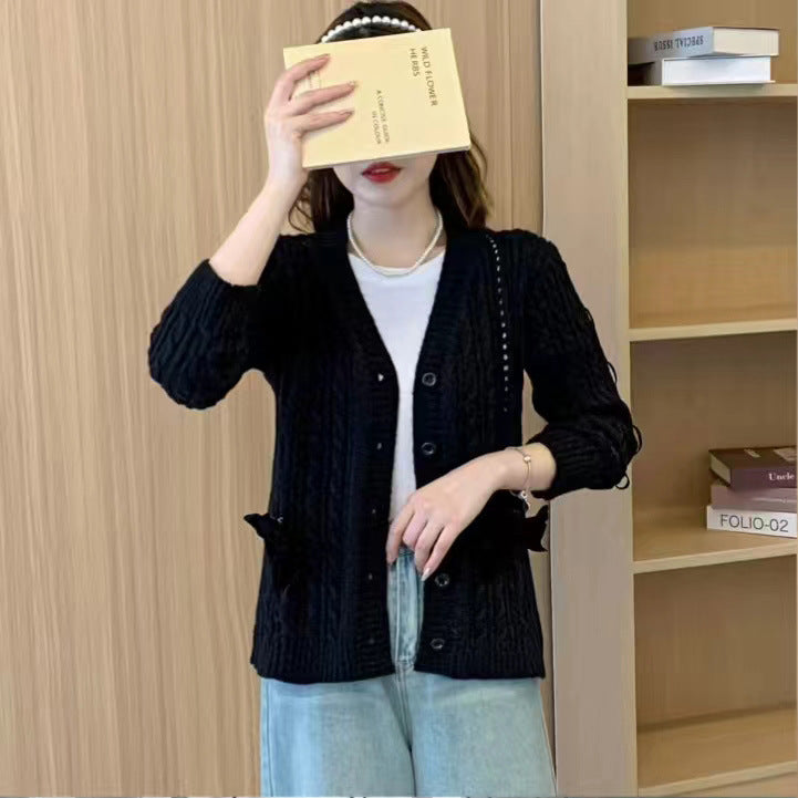 Damen Strickjacke mit dekorativen Taschen und Wellenmuster Drune