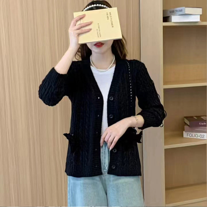 Damen Strickjacke mit dekorativen Taschen und Wellenmuster Drune