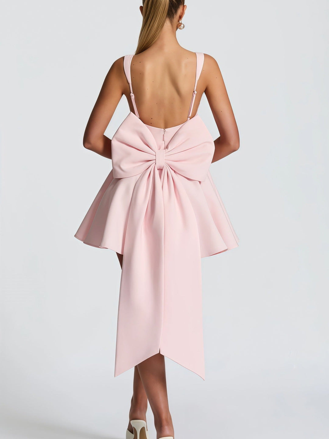 Damen Cocktailkleid mit oversized Schleifen-Design und fließendem Rock Drune