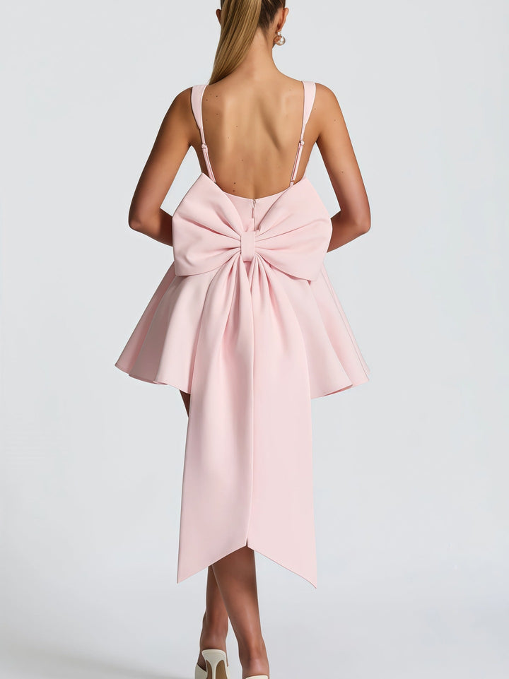 Damen Cocktailkleid mit oversized Schleifen-Design und fließendem Rock Drune