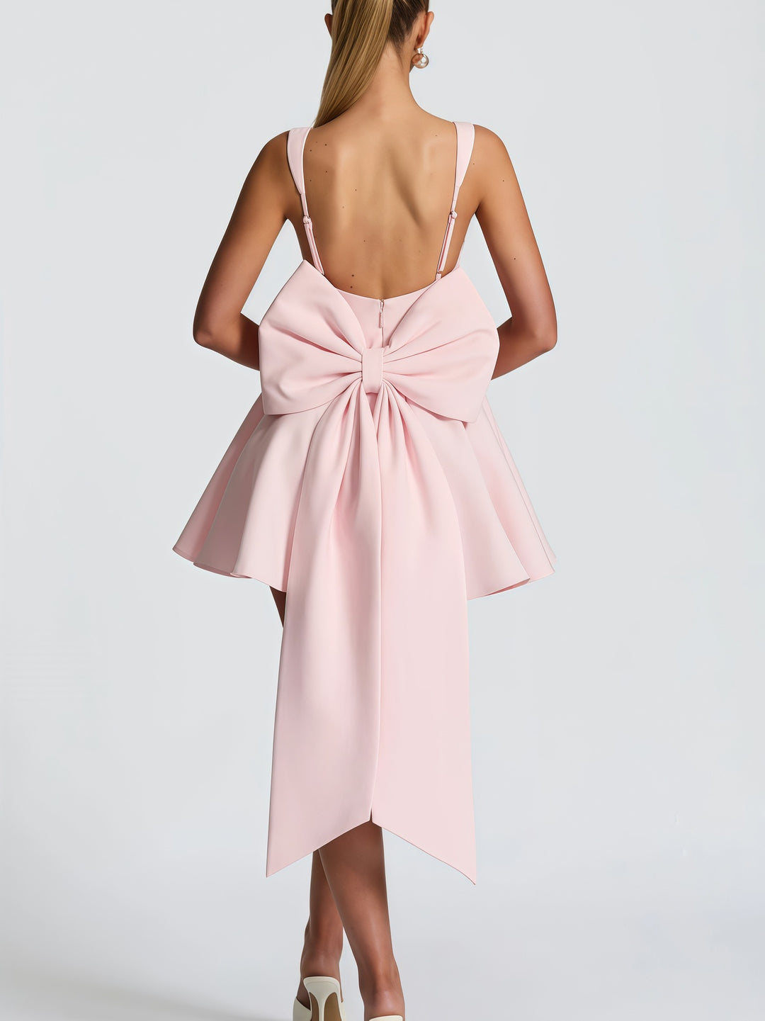 Damen Cocktailkleid mit oversized Schleifen-Design und fließendem Rock Drune