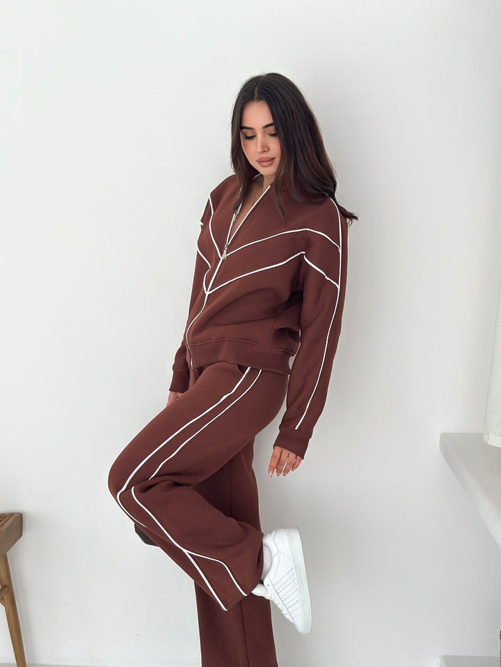 Damen Sportanzug mit stylischen Kontrastelementen und hohem Kragen Drune
