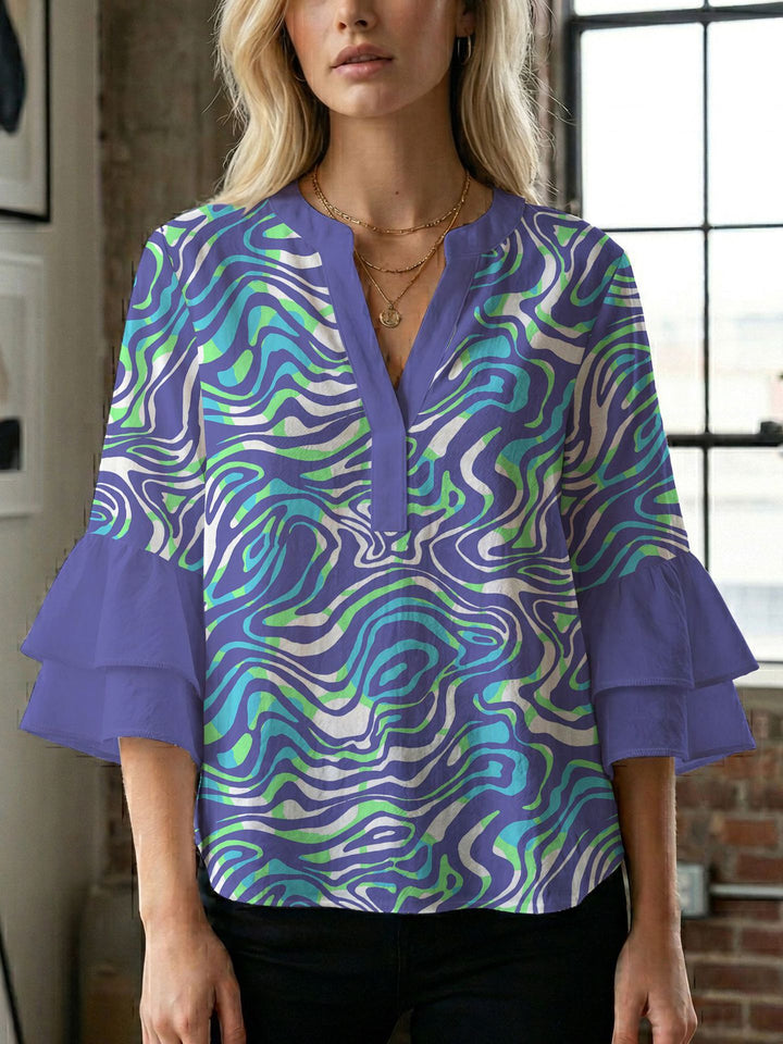 Damen Bluse mit voluminösen Flügelärmel und intensivem Blattmuster Drune